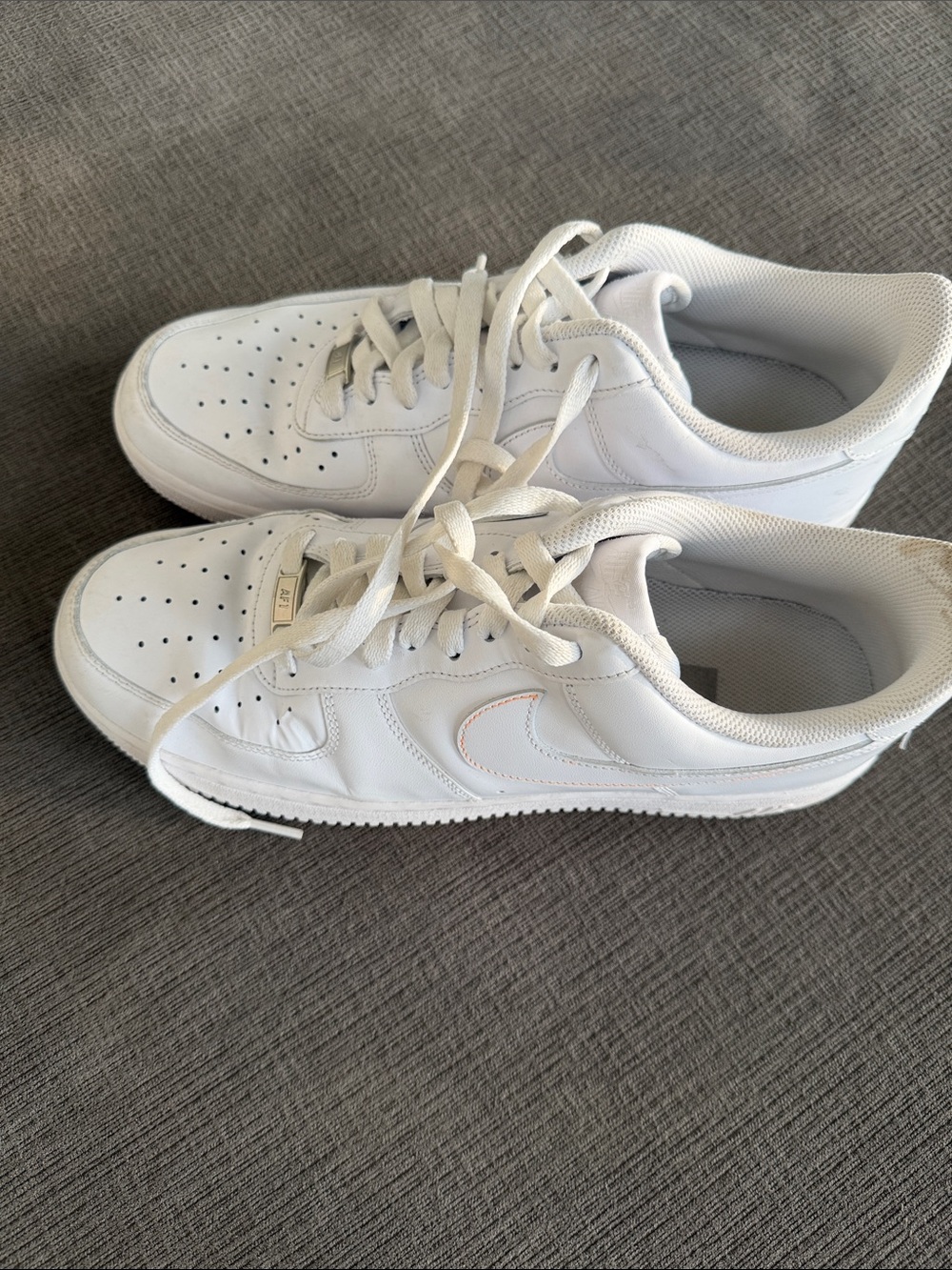 Nike White Low-Top Air Force 1 Leather Sneakers with Subtle Stitch Swoosh